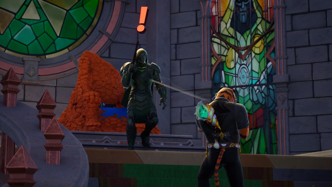 fortnite oscar tiger facing doombot in castle doom
